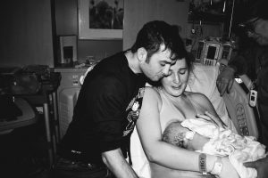 new family just after birth in hospital