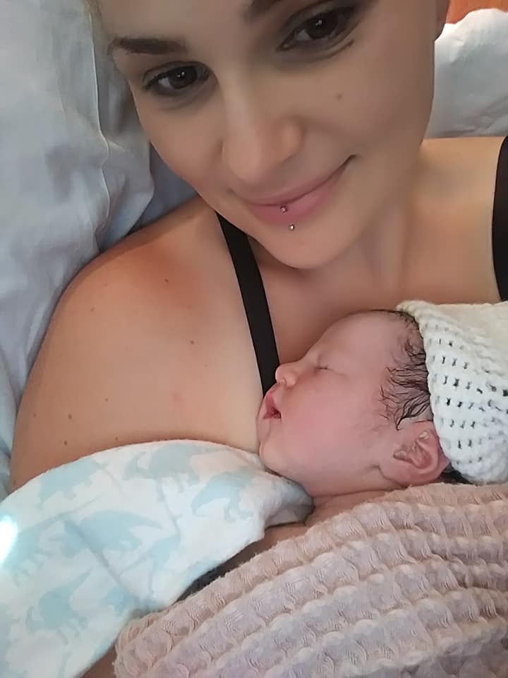 Hypno-mom Ashley snuggling her newborn baby