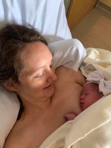 Hypno-mom Alyssa skin to skin with newborn daughter.