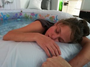 Hypno-mom resting in birthing tub