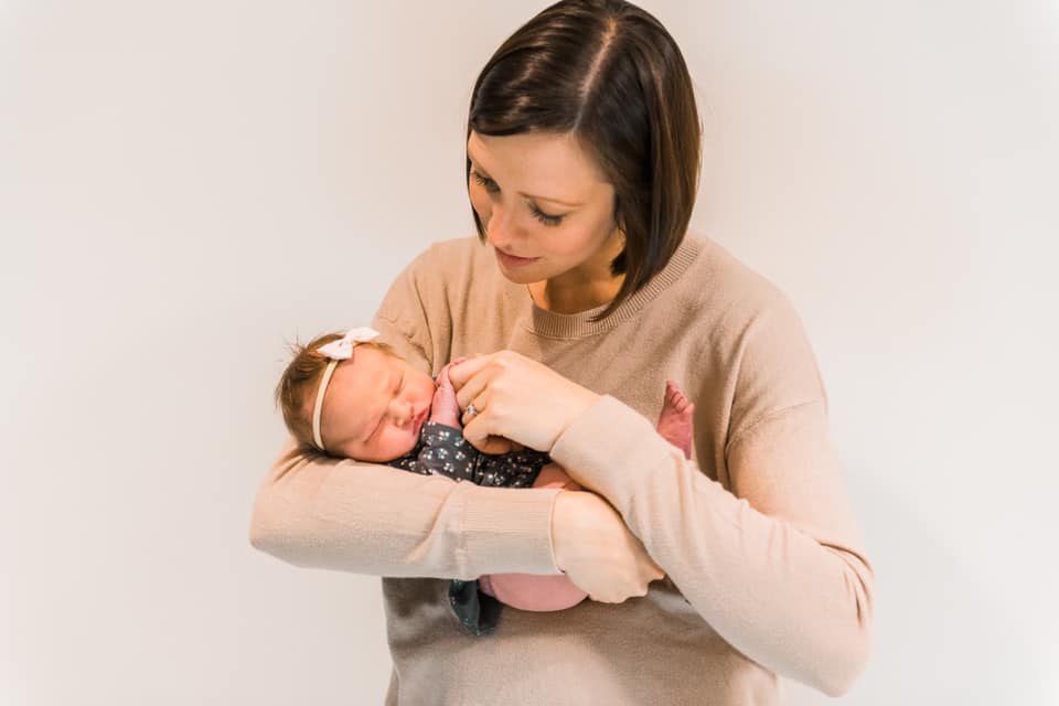 Hypno-mom Megan holding her newborn daughter