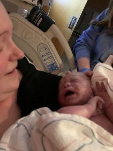 Hypno-mom Risa and Newborn baby in hospital bed