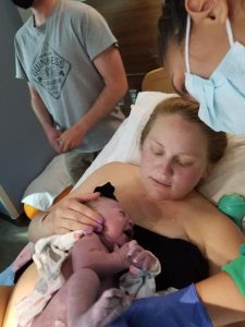 Hypno mom and newborn in hospital bed just after birth