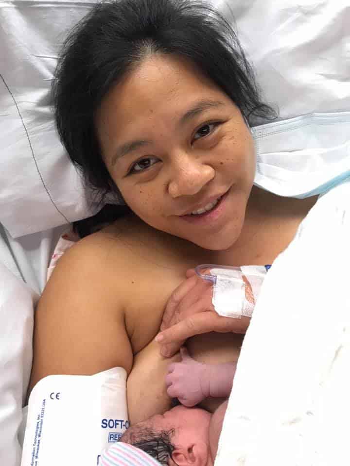 Hypno-mom nursing her newborn in hospital bed