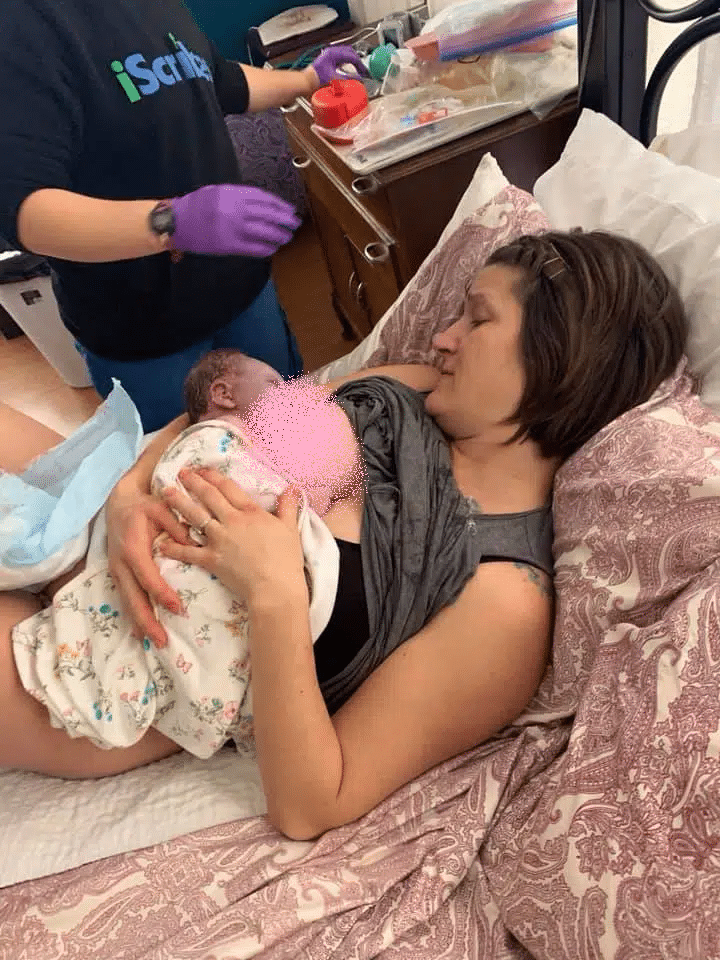 Mom nursing newborn in the hospital