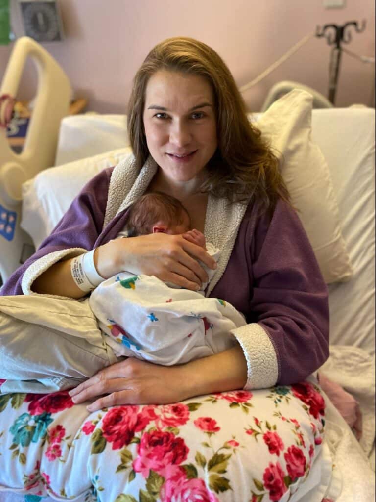 New parent holding newborn baby