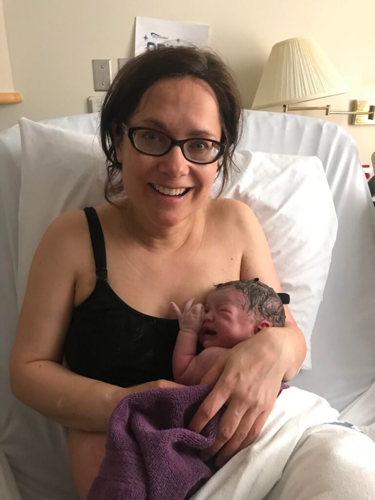Hypnobabies Hospital VBAC Student Holding Newborn