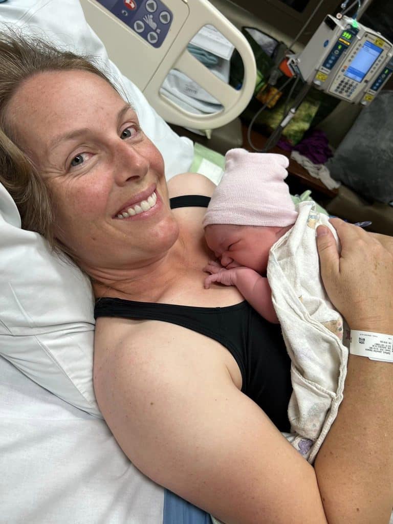 Hypnobabies Student holding newborn baby just after birth