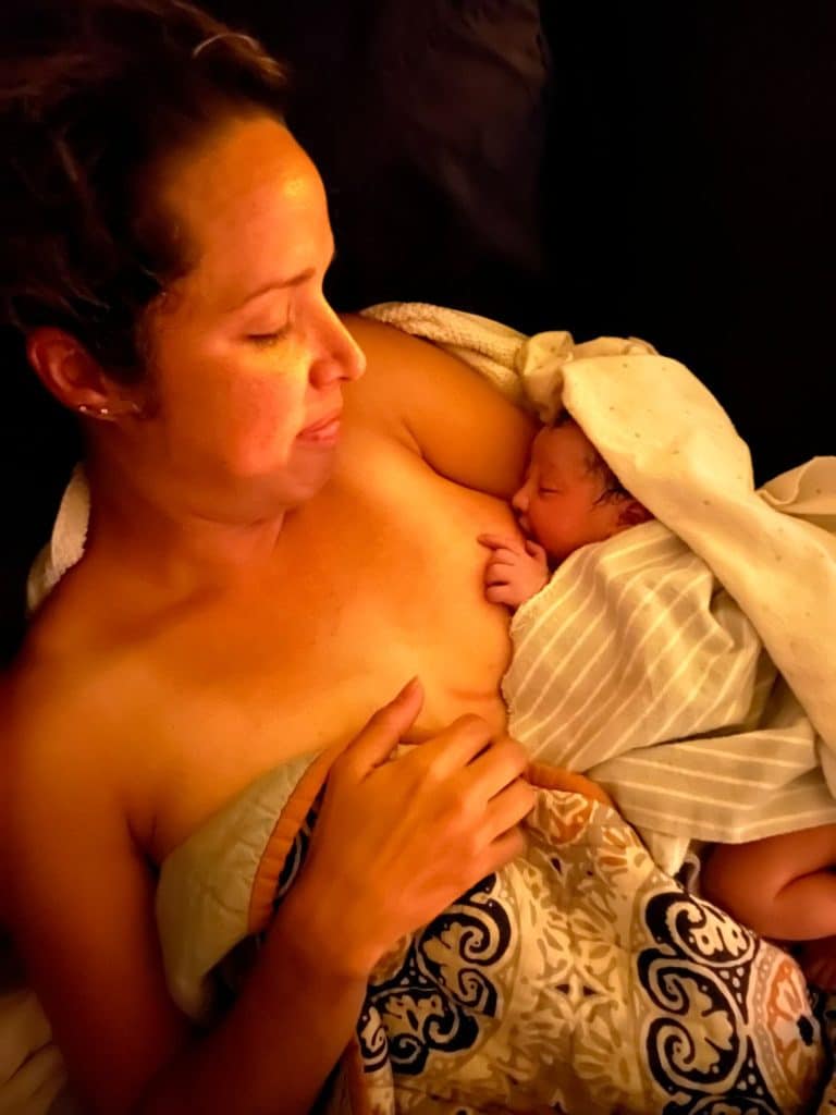 New parent holding newborn